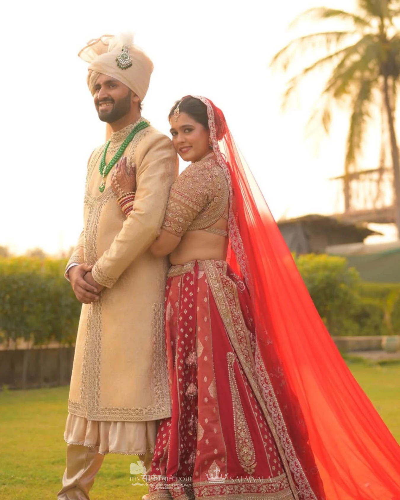 Classic groom pagdi styled with a red ceremonial stole for Vake